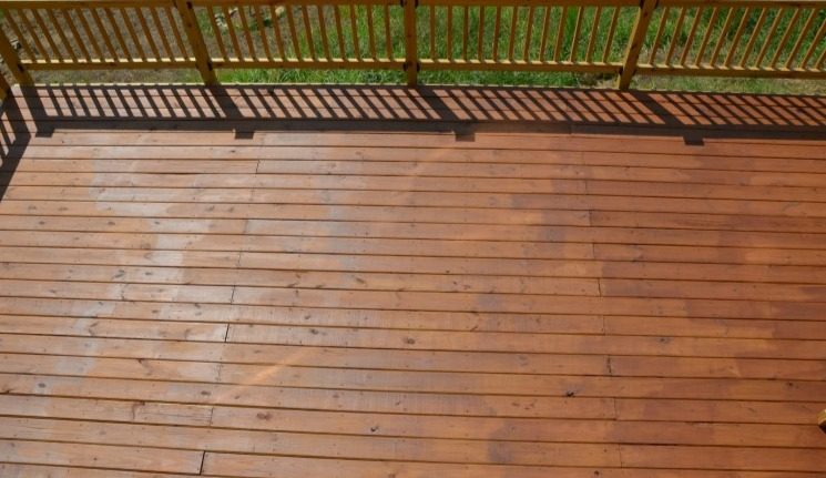 Home Cuts Professional lawn Service LLC Weatherproofed Wooden Deck